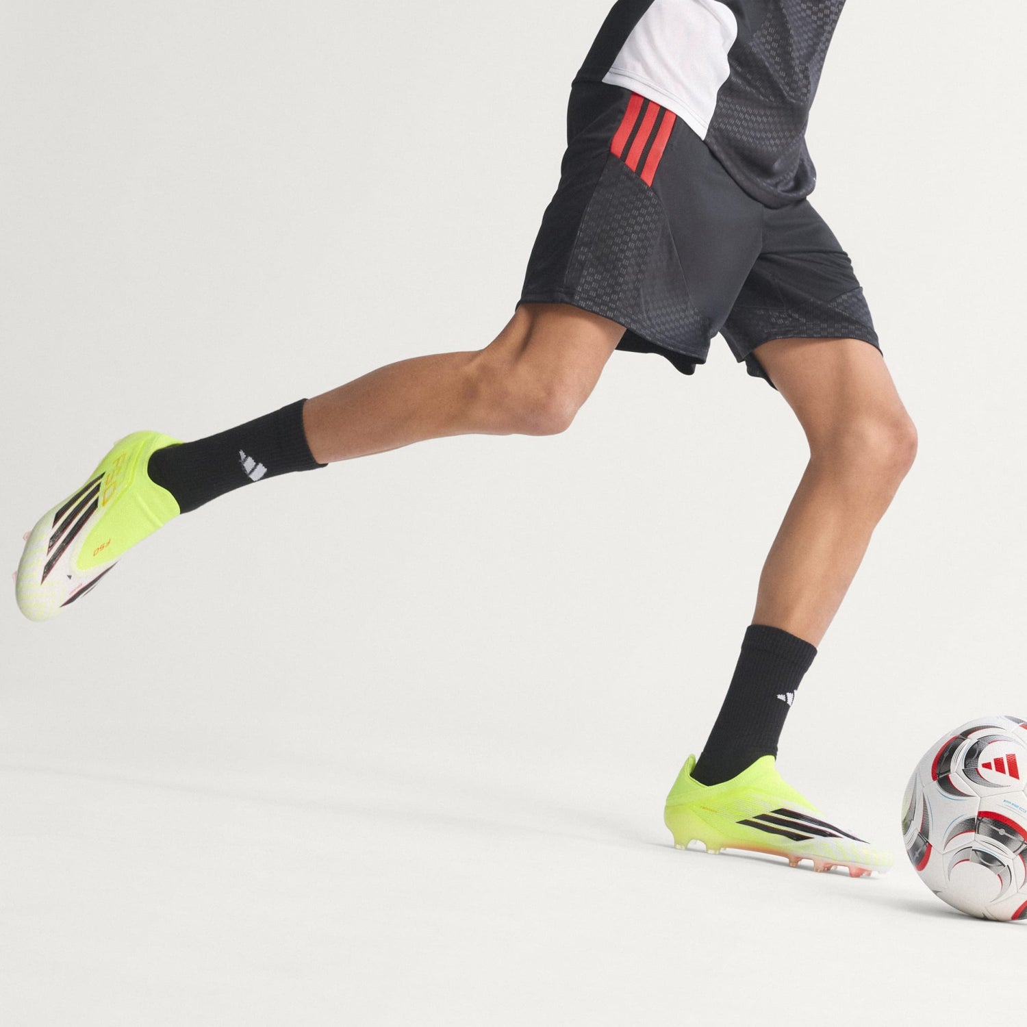 F50 Elite Laceless FG [Team Solar Yellow 2/Core Black/Lucid Red]