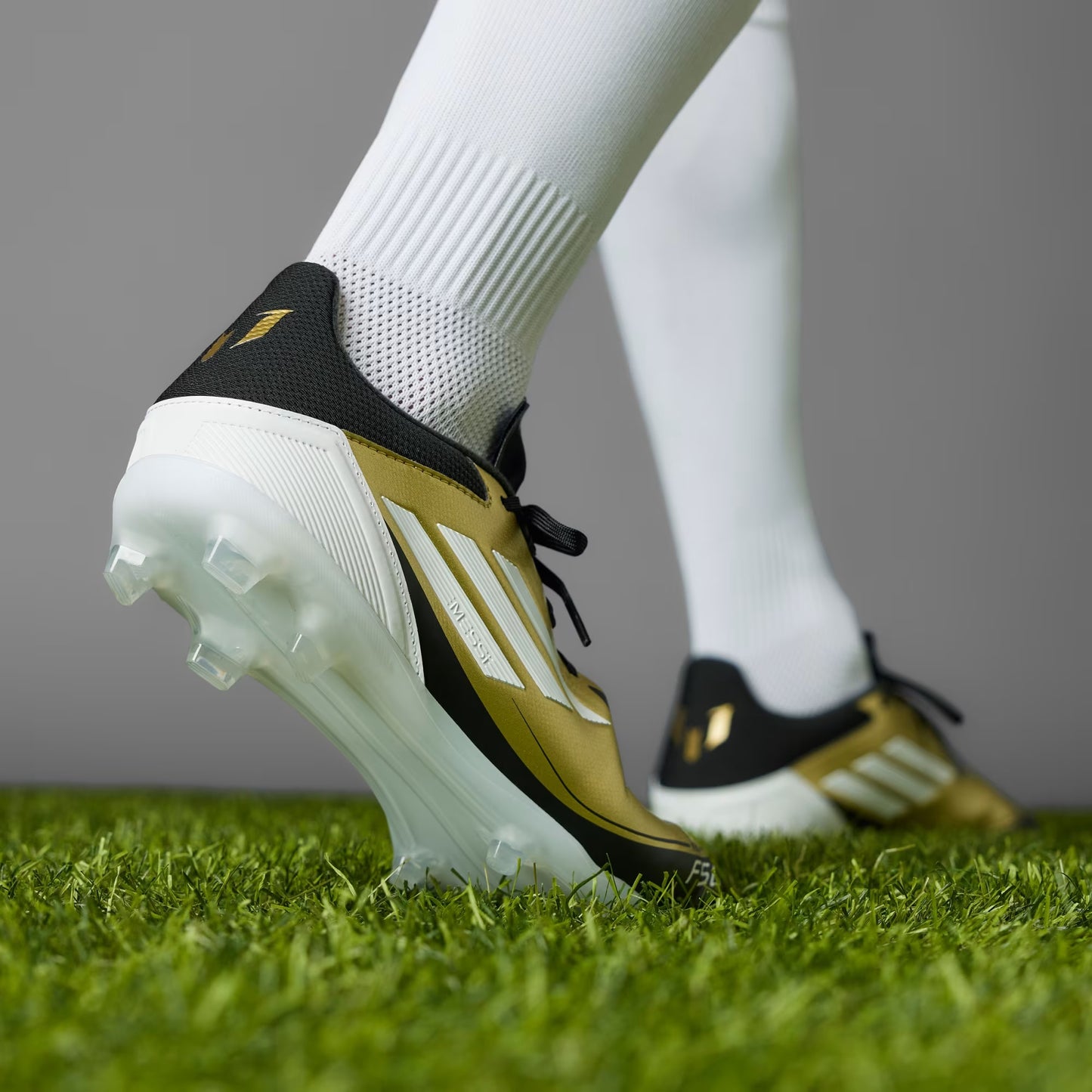 F50 Messi League FG/MG [Black/Gold]